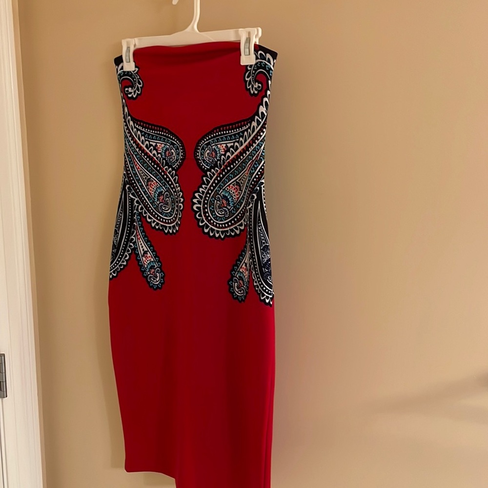 Red below the knee strapless dress